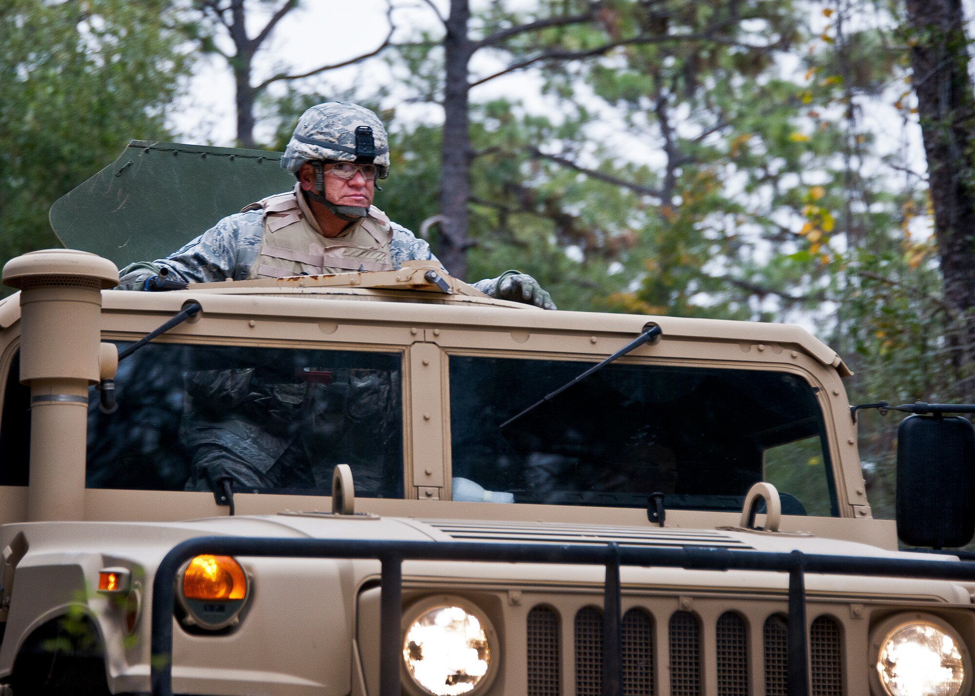 Master Sgt. Hector Barrios, of the 96th Security Forces Squadron, looks for improvised explosive device indicators during a detection scenario at Eglin Air Force Base, Fla.  The exercise, along with a targeting acquisition scenario tested Airmen’s new abilities after participating in a six-week vision training experiment called Battlevision.  The Airmen who took the training scored higher on both scenarios than the control group who had not.  (U.S. Air Force photo/Samuel King Jr.)