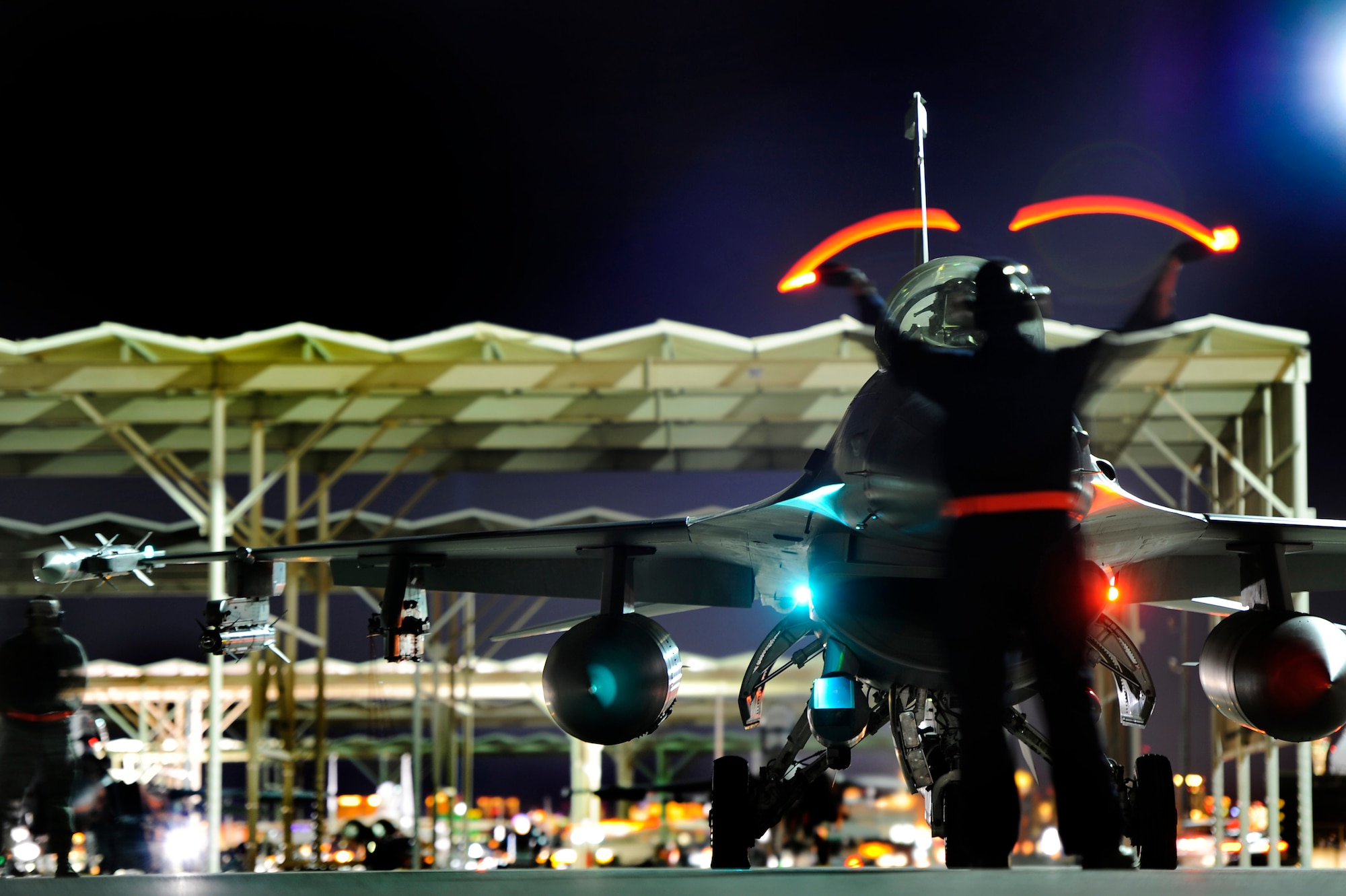 A U.S. Air Force crew chief assigned to the 20th Aircraft Maintenance Squadron, prepares to launch an F-16 Fighting Falcon assigned to the 79th Fighter Squadron ‘Tigers’ during Red Flag 13-3, Feb. 27, 2013, Nellis Air Force Base, Nev. Maintainers and crew chiefs have worked around-the-clock since the start of Red Flag to ensure 79th FS aircraft are ready to fly. (U.S. Air Force photo by Staff Sgt. Kenny Holston/Released)