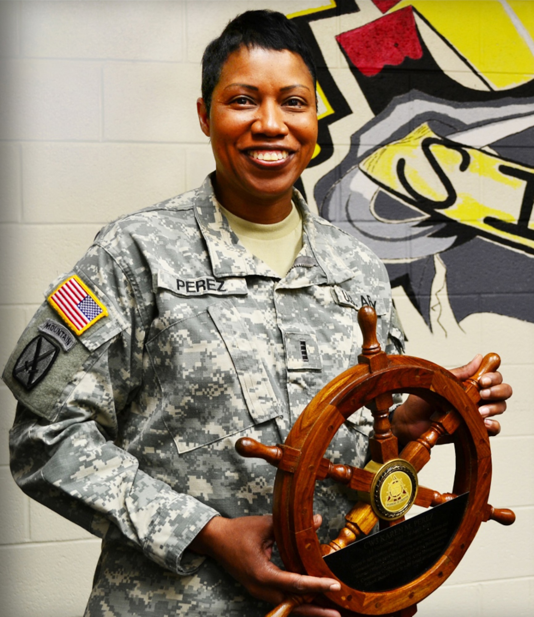 U.S. Army Chief Warrant Officer 4 Karen Perez serves in the 53rd Movement Control Battalion's plans section as a subject matter expert in logistics. Perez, a native of Hampton, Va., has served in the Army for 27 years, with 15 years of service as an enlisted Soldier before becoming a mobility warrant officer. 
(U.S. Army photo by Sgt. Edwin J. Rodriguez/Released)
