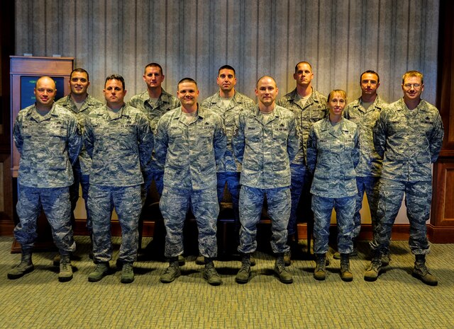 Twelve members of Team Charleston were selected for promotion to the rank of senior master sergeant Feb. 28, 2013. (Front row) Senior master sergeant (selects) are Christopher Wilson, Kurt McNeely, Michael Stone, Shawn Brugh, Tina Friday, Ricky Smith, (back row) Jamey Elms, John Lipsey, Steven Hart, Scott Levesque, Justus Hanks. Not pictured is Earl Ragland. More than 1,360 master sergeants were selected Air Force wide out of 12,834 eligible, for promotion. (U.S. Air Force photo/Airman 1st Class Tom Brading)