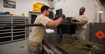 U.S. Air Force Senior Airman Jorge Silva, weapons load crew member, (right), and Staff Sgt. Carlyle Tucker, weapons load crew chief, of the 1st Special Operations Equipment Maintenance Squadron, perform a weapons function check on a GAU-21 at Hurlburt Field, Fla., Feb. 27, 2013. Function checks are completed before and after each flight. (U.S. Air Force photo by Senior Airman Krystal M. Garrett)