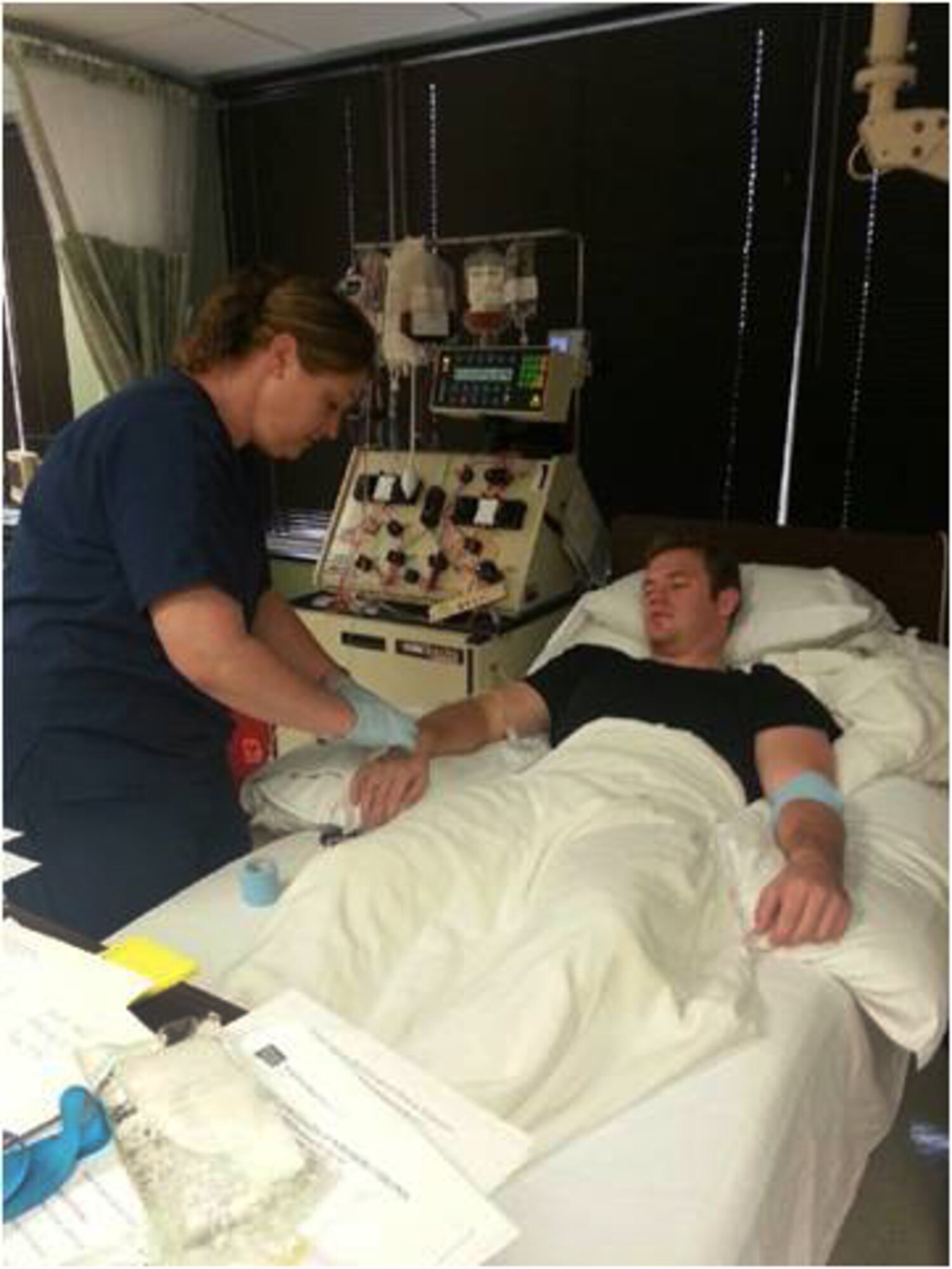U.S. Air Force Capt. Neal Wendt, 609th Air Communications Squadron director of operations, prepares for the stem cell procedure as part of the C.W. Bill Young Department of Defense marrow donor program at Fairfax Pathology Associates in Fairfax, Va., Nov. 7, 2012. The C.W. Bill Young Department of Defense program created a marrow donor in which active-duty service members, National Guardsmen, Reservists, DOD employees, dependents and retirees may register to save military and civilian lives. (Courtesy photo)