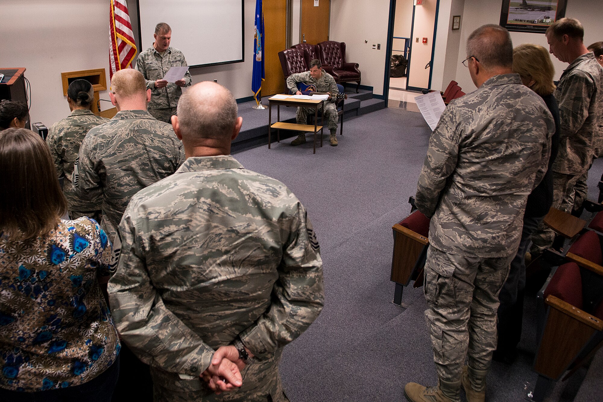 Members of the 307th Bomb Wing attend a morning worship service during a Unit Training Assembly, Mar. 3, 2013, Barksdale Air Force Base, La. All military and civilian members are invited to attend this service, which is held every Sunday morning of the main UTA from 1030 to 1100. (U.S. Air Force photo by Master Sgt. Greg Steele/Released)