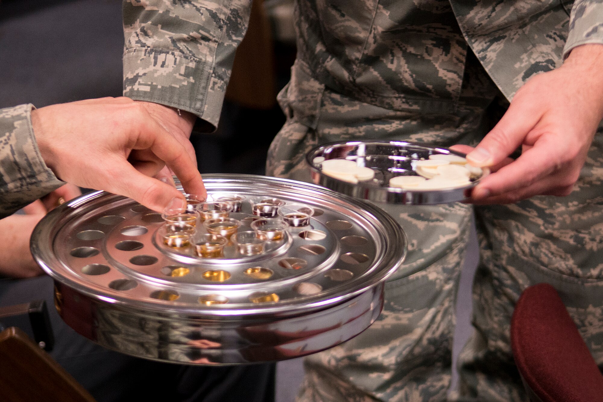 Communion is offered during a morning worship service, Mar. 3, 2013, Barksdale Air Force Base, La. The 307th Bomb Wing Chaplains Office holds a morning worship service every Sunday of the main Unit Training Assembly from 1030-1100 in the main auditorium. (U.S. Air Force photo by Master Sgt. Greg Steele/Released)