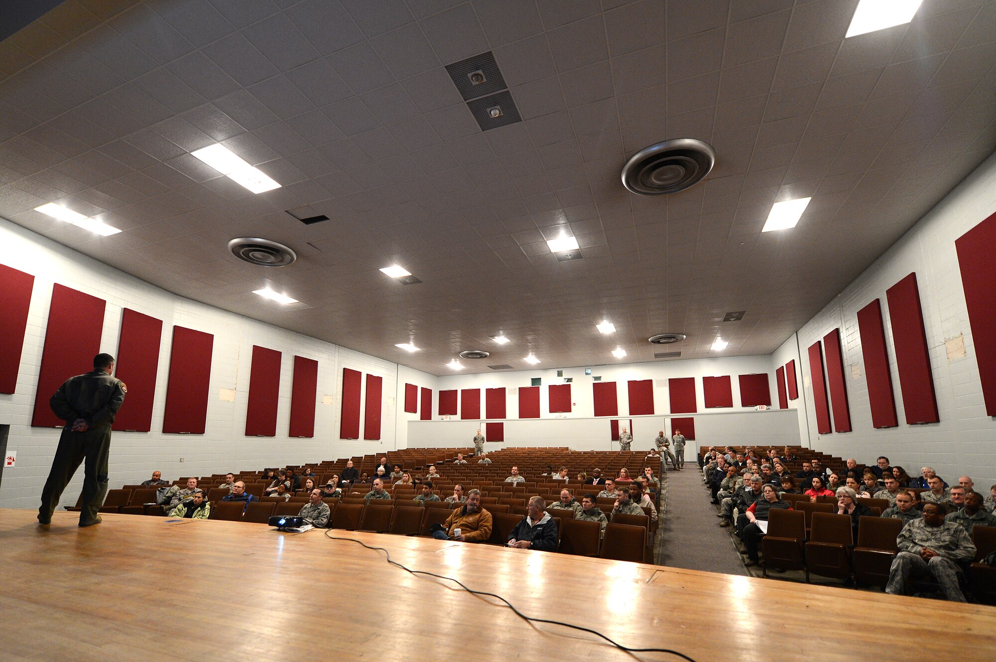 U.S. Air Force Col. Clay Hall, 20th Fighter Wing commander, speaks to Airmen and civilians at Shaw during a public meeting at Shaw Air Force Base, S.C., Feb., 28, 2013.  During the meeting, Hall spoke about local impacts of sequestration, military contracting at Shaw, renovations in the single Airmen dorms and other upcoming projects for modernization at Shaw. (U.S. Air Force photo by Airman 1st Class Nicole Sikorski/Released)