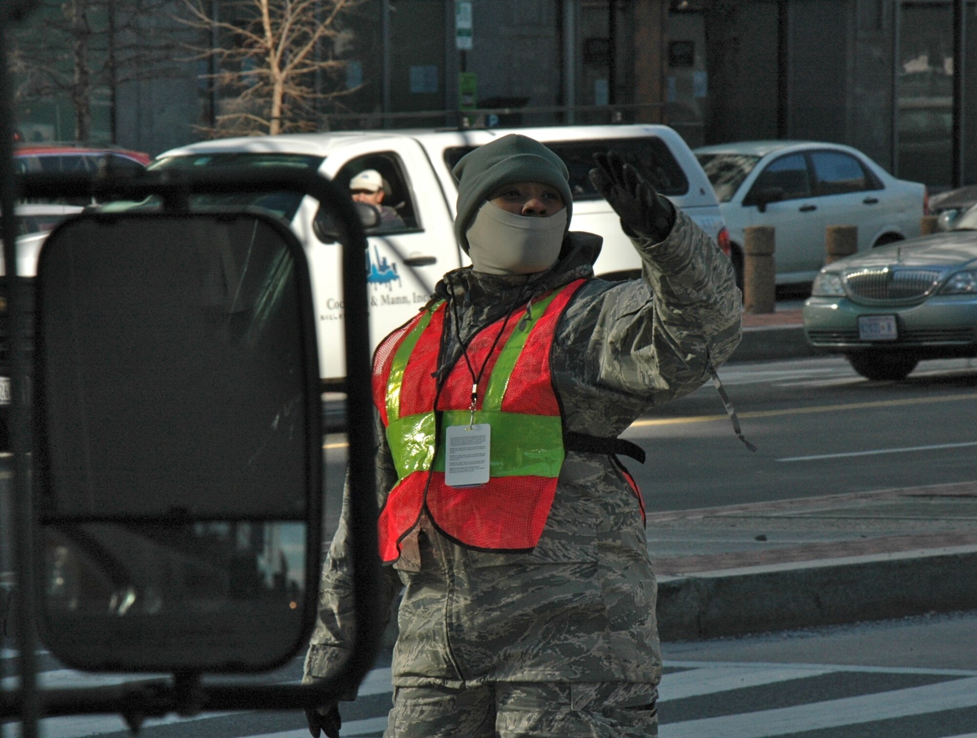 Airman Sharronie Hunter, 192nd Fighter Wing, Security Forces Squadron, operates traffic control points in support of the 57th Presidential Inauguration Jan. 21, 2013 in Washington, D.C.  More than 600 Virginia National Guard Soldiers and Airmen joined a force of approximately 6,000 National Guard personnel from 25 states and territories supporting the inauguration with traffic control, crowd management, communications and chaplain support.  (Photo by Sgt. 1st Class A.J. Coyne, Virginia Guard Public Affairs)