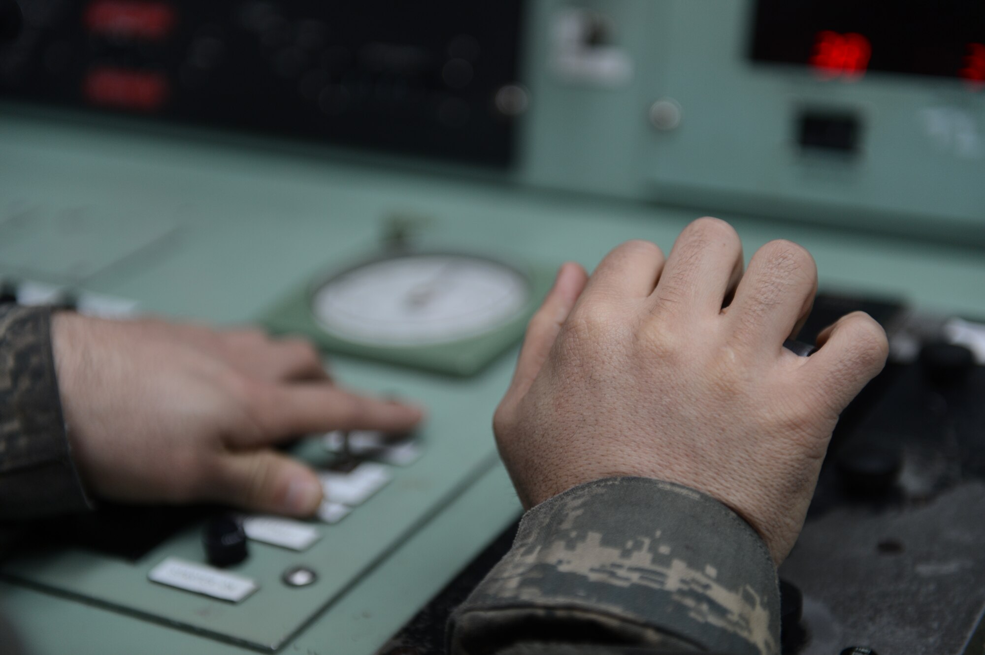 SPANGDAHLEM AIR BASE, Germany – Staff Sgt. Jason De La Vega, 52nd Component Maintenance Squadron aerospace propulsion technician from Las Vegas, adjusts the throttle of an F-16 Fighting Falcon engine Feb. 27, 2013. The 52nd CMS tests the engine at multiple levels of thrust to ensure it is able to deliver power to aircraft. (U.S. Air Force photo by Airman 1st Class Gustavo Castillo/Released)