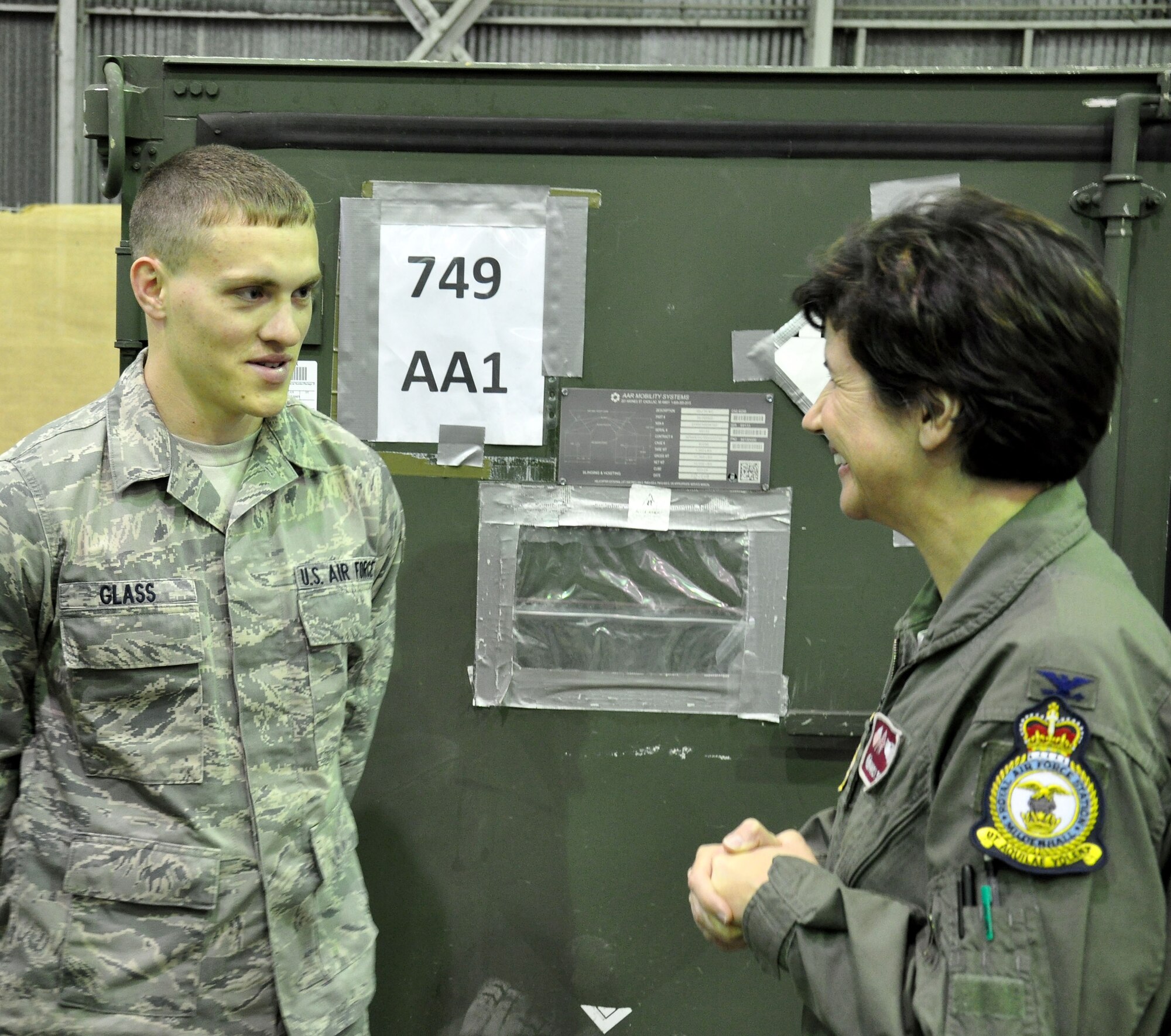 Col. Nancy Bozzer, 100th Operations Group commander, talks with Airman 1st Class Nathanael Glass, 100th Logistics Readiness Squadron, during Bozzer’s visit to a deployed location in southwest Europe March 4, 2013. As part of a KC-135 Stratotanker tail swap at the deployed location, Bozzer had the opportunity to visit all Airmen of the 351st Expeditionary Air Refueling Squadron. The 351st EARS, which deployed from the 100th Air Refueling Wing, RAF Mildenhall, England, has been supporting French operations in Mali since January 2013. (U.S. Air Force photo by Capt. Jason Smith)
