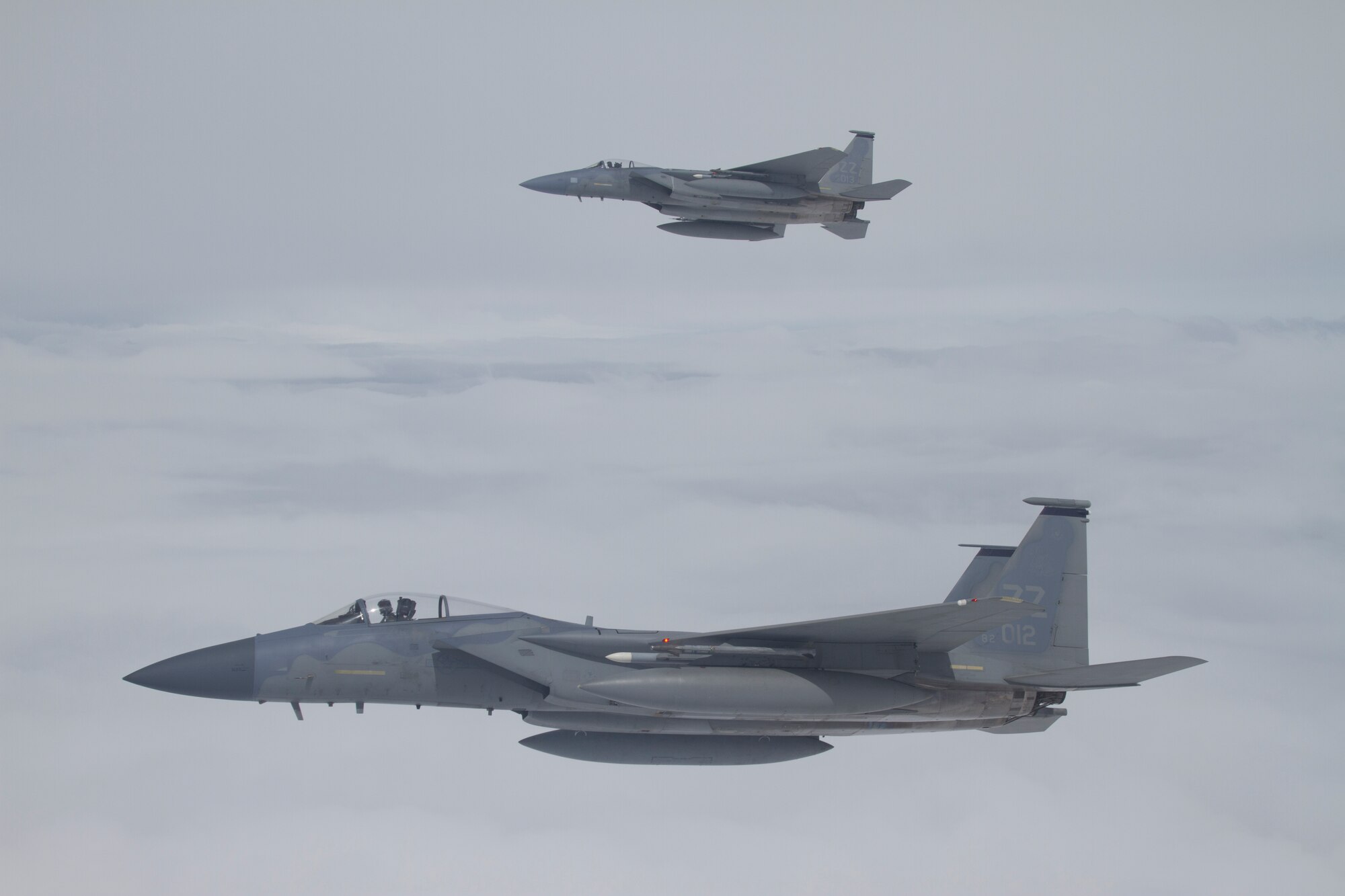 Two 44th Fighter Squadron F-15 Eagle fighter aircraft from Kadena Air Base, Japan, fly in formation. Gen. Herbert Carlisle, Pacific Air Forces commander, recently announced Kadena's 44th FS, known as the "Vampire Bats," as winner of the Raytheon Trophy for 2012. (Courtesy photo by Jake Melampy)