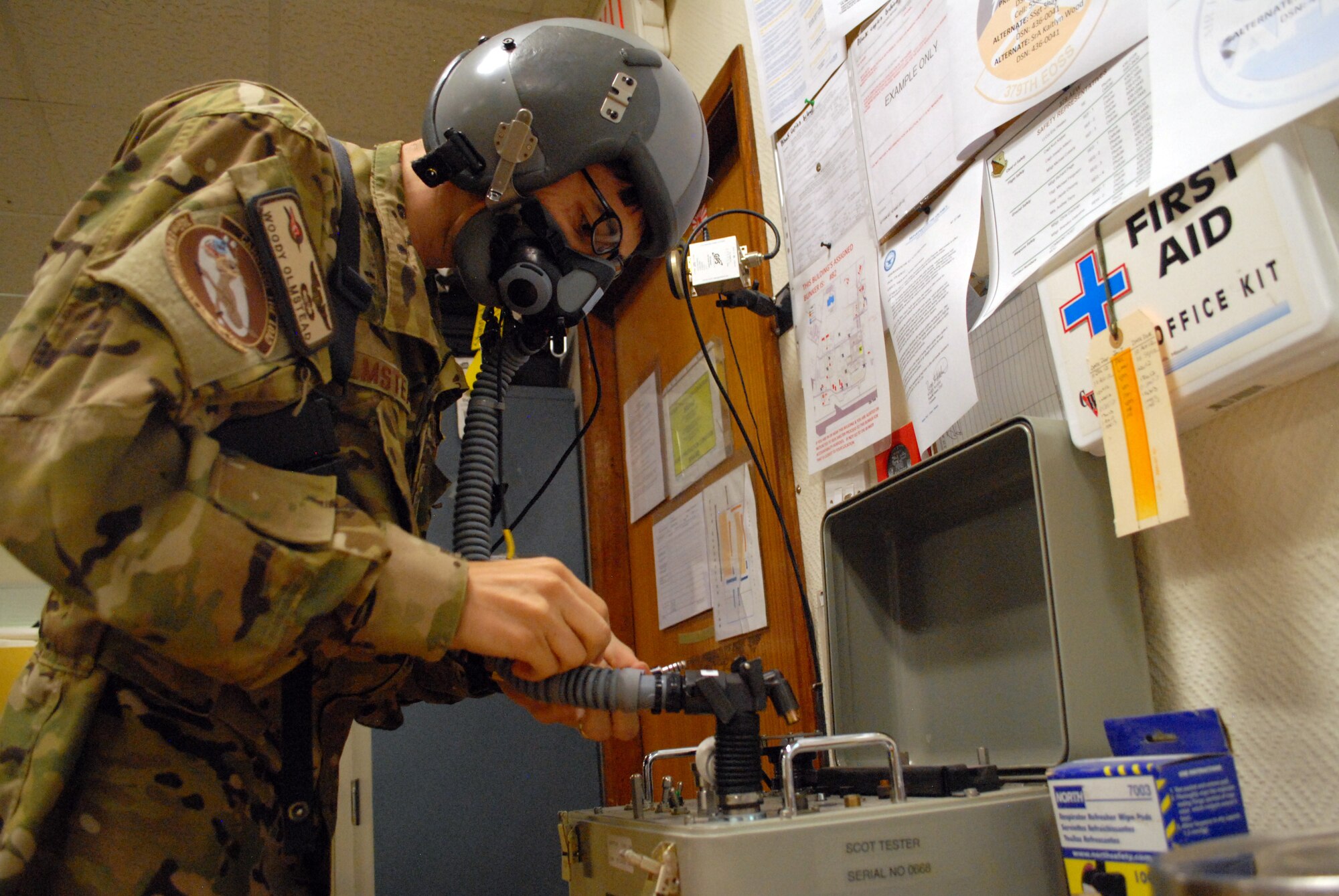 SOUTHWEST ASIA -- Capt. Woody Olmstead checks his life support equipment before his mission aboard a C-130, Mar. 4. Members of the 746th Expeditionary Airlift Squadron, comprised of Reservists from the 908th Airlift Wing, Maxwell AFB, Ala., and 440th Airlift Wing, Pope Field, N.C., prepare to transport cargo downrange in the U.S. Central Command area of responsibility. (U.S. Air Force photo/Master Sgt. Christian Michael)