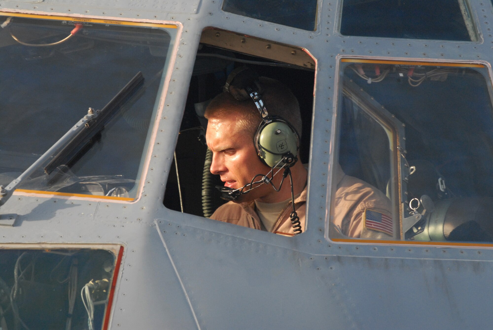 SOUTHWEST ASIA -- Master Sgt. Aubrey Walters, 746th Expeditionary Airlift Squadron duty flight engineer, runs preflight checklists, Mar. 4. Members of the 746th EAS and Expeditionary Aircraft Maintenance Squadron, comprised of Reservists from the 908th Airlift Wing, Maxwell AFB, Ala., and 440th Airlift Wing, Pope Field, N.C., prepare to transport cargo downrange in the U.S. Central Command area of responsibility. (U.S. Air Force photo/Master Sgt. Christian Michael)