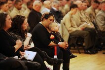 Family members of Cpl. Christopher M. Monahan Jr., a Marine with Transportation Company, Combat Logistics Battalion 2, 2nd Marine Logistics Group, who was killed in Afghanistan, listen to personal stories from Monahan’s fellow servicemembers during a memorial service aboard Camp Lejeune, N.C, Feb. 22, 2013. Monahan served as a motor transportation operator and turret gunner operating with the battalion out of Camp Leatherneck, Afghanistan.