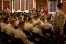 Marines with Combat Logistics Battalion 2, 2nd Marine Logistics Group rise as the unit’s sergeant major conducts a roll call during a memorial service aboard Camp Lejeune, N.C., Feb. 22, 2013. The memorial honored two of the unit’s fallen, Cpl. Christopher M. Monahan Jr. and Lance Cpl. Dale W. Means, motor transportation operators with Transportation Support Company, CLB-2, who were killed while supporting combat operations in Helmand province, Afghanistan. 
