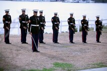 A rifle detail stands ready to fire three volleys during a memorial service held by Combat Logistics Battalion 2, 2nd Marine Logistics Group aboard Camp Lejeune, N.C., Feb. 22, 2013. The battalion honored two of its fallen Marines, Cpl. Christopher M. Monahan Jr. and Lance Cpl. Dale W. Means, motor transportation operators with Transportation Support Company, who were killed while serving in Helmand province, Afghanistan, November 2012.  