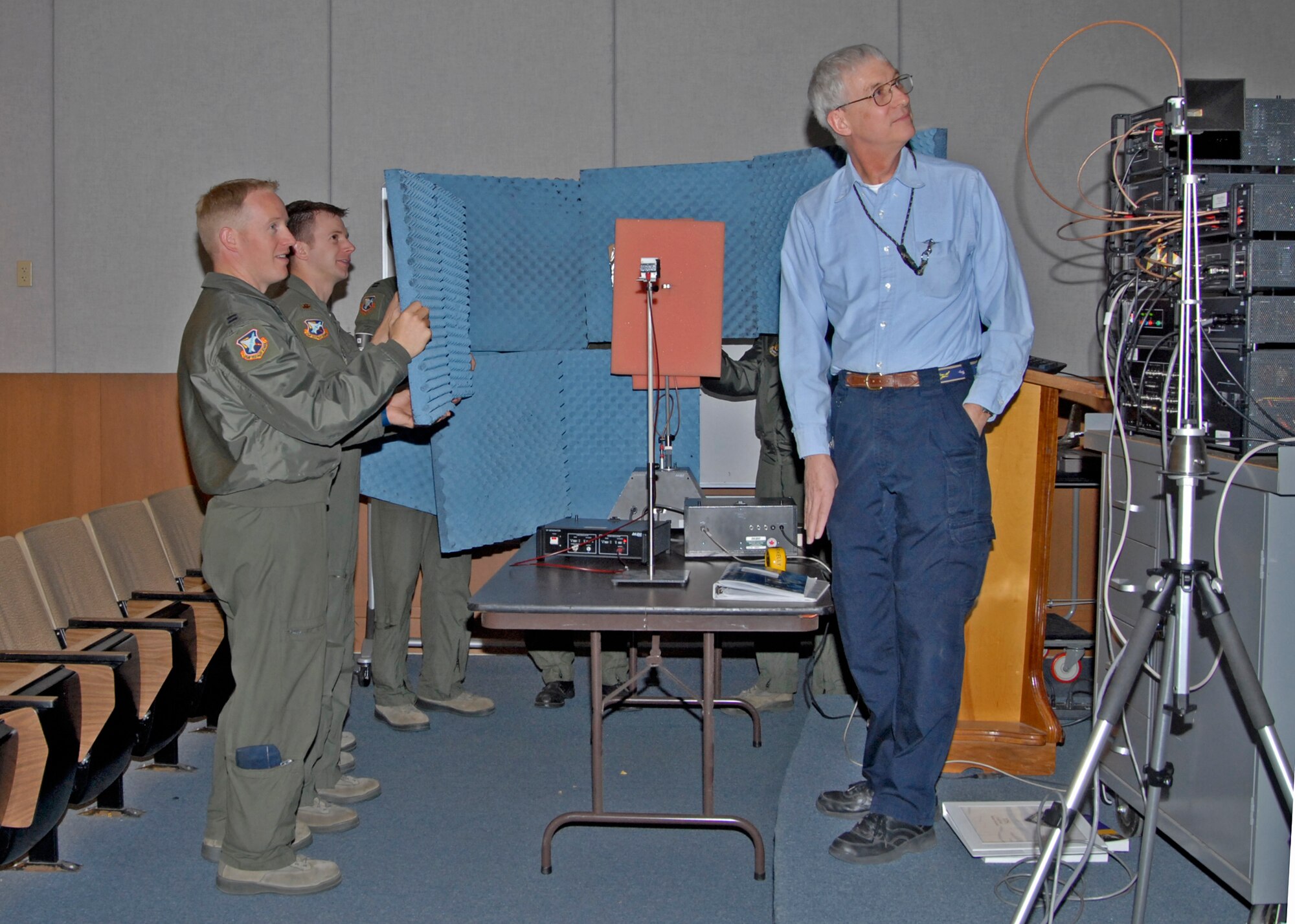 Randy Kelly, United States Air Force Test Pilot School Systems master instructor, demonstrates a lesson to members of the school's 12B class.  Throughout the remaining calendar year, the school will modernize its curriculum to keep the students and the Air Force on the leading edge of technology. For TPS, that means integrating cyber and space into an already intensive year-long master’s program. (U.S. Air Force photo by Laura Mowry)