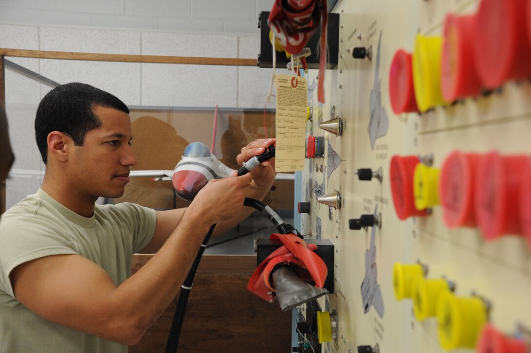 Airman First Class Maurice Simmons of the 365th Training Squadron practices jet repairs in the classroom March 6, 2013. Student are expected to apply what they learn in the classroom to real scenarios out on the flight line. (U.S. Air Force photo by Airman First Class Jelani Gibson) 