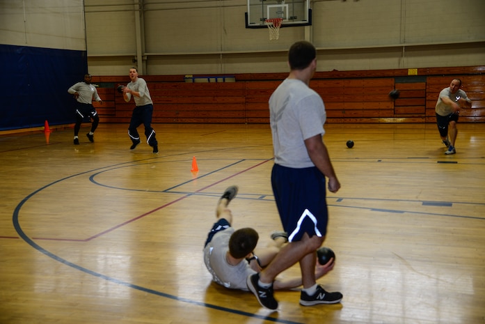 Airmen from the 628th Comptroller Squadron aim for 628th Civil Engineer Squadron Airmen during the Commander's Fitness Challenge dodgeball game March 1, 2013, at the Fitness Center on Joint Base Charleston – Air Base, S.C. The 628th CES won the tournament.  (U.S. Air Force photo/Staff Sgt. Rasheen Douglas)