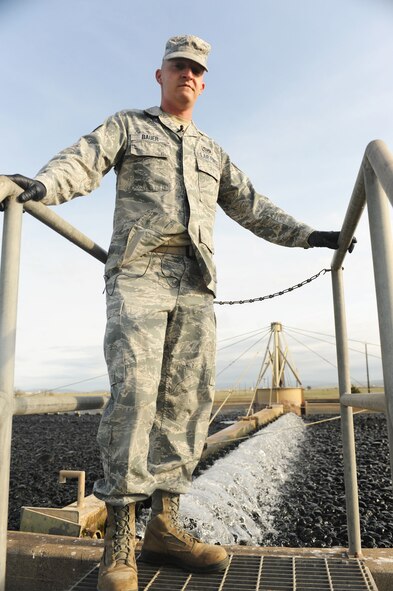 Staff Sgt. Paul Bauer, 9th Civil Engineer Squadron water and fuels system maintenance journeyman, oversees the trickling filter, which is used as a bio-filtration system, at the waste water facility on Beale Air Force Base, Calif., March 5, 2013.  The facility safely treats the waste water on Beale and provides clean drinking water. (U.S. Air Force photo by Airman 1st Class Bobby Cummings/Released)