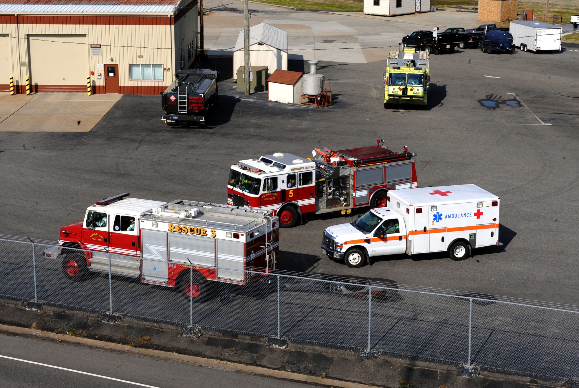 Langley first-responders prepare to clear the scene after a fuel spill exercise at Langley Air Force Base, Va., Feb. 28, 2013. Fuel spill exercises are conducted to observe emergency response teams as they assess the situation and contain the spill. (U.S. Air Force photo by Senior Airman Brittany Paerschke-O’Brien/ Released)