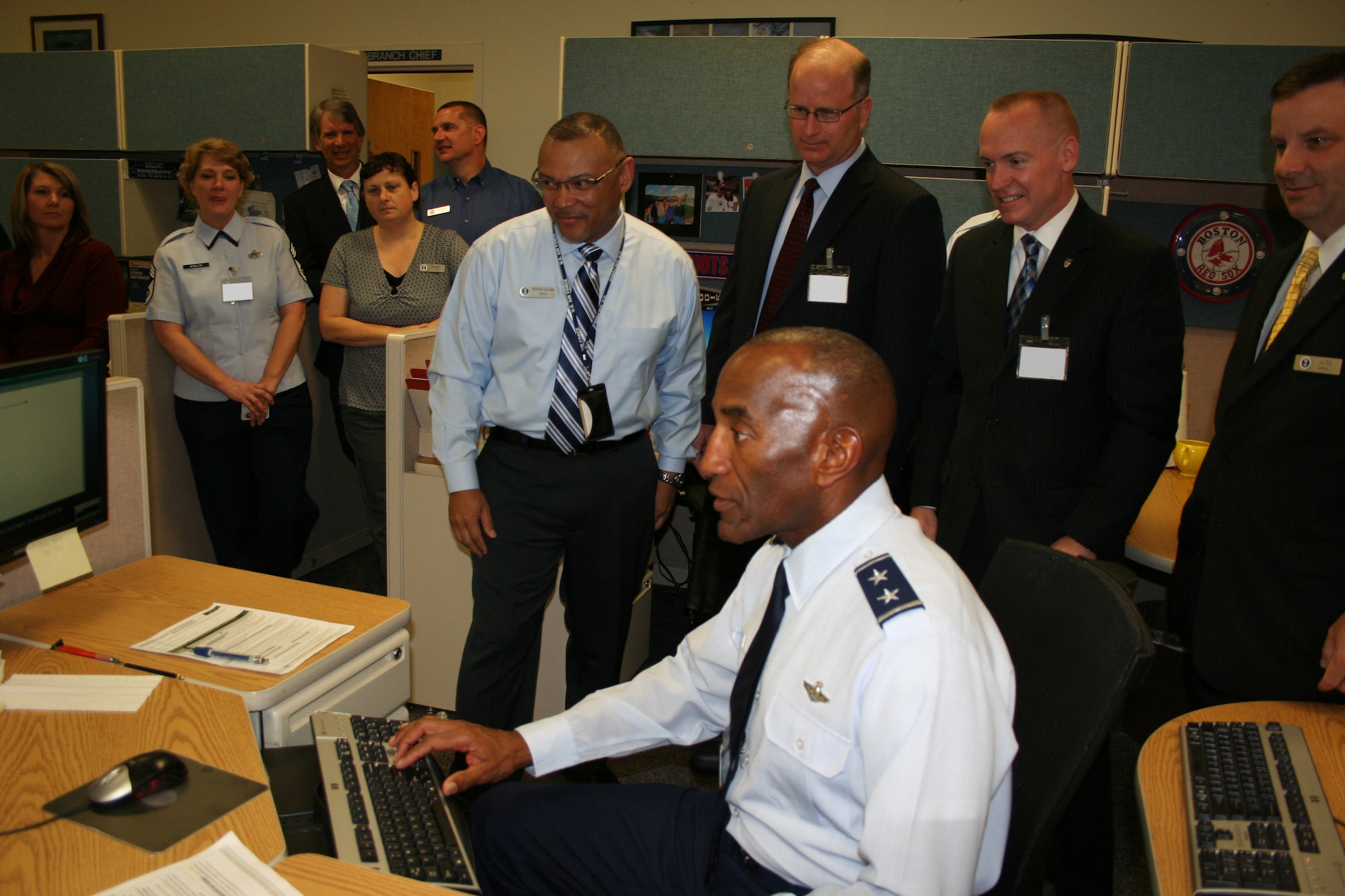 Air Force Personnel Center Commander Maj. Gen. A.J. Stewart pushes the button to shut down the Military Personnel Data System and initiate a full upgrade. MilPDS is expected to be unaccessible for up to 23 days.
