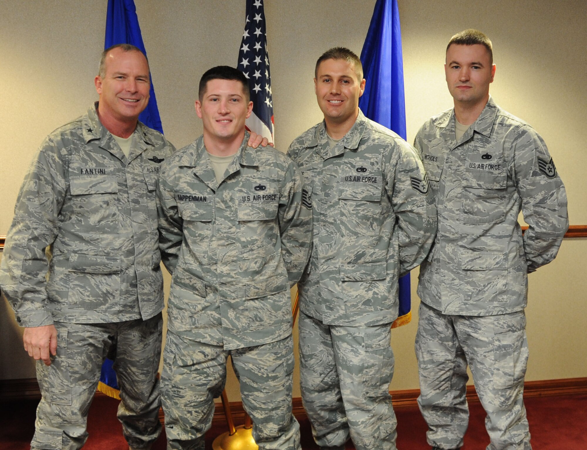 Brig. Gen. Michael Fantini (left), 82nd Training Wing commander, congratulates (right to left) Tech. Sgt. Justin Kappenman, 363rd Training Squadron and Staff Sgt. Christopher Moe, 361st Training Squadron, and Staff Sgt. Justin Nichols, 363rd Training Squadron, on their selection for Officer Training School by the rated officer board March 6, 2013.  Three other NCOs stationed at 82nd TRW detachments were also selected for OTS.  (U.S. Air Force photo/Airman 1st Class Jelani Gibson)