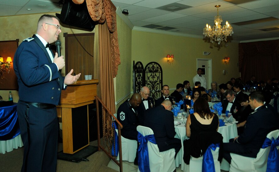Chaplain (Capt.) Bradley Fink, delivers the invocation during Sharkfest 2013 at the Royal Palace Banquet Hall in Homestead, Fla., March 2. Members of Homestead Air Reserve Base’s 482nd Fighter Wing, 482nd Maintenance Group, and Det 2, 20th Operations Group  gathered for the event which is an awards banquet where maintenance personnel from the base were recognized and honored for exceptional and outstanding performance throughout the previous year. (U.S. Air Force photo/Senior Airman Nicholas Caceres)