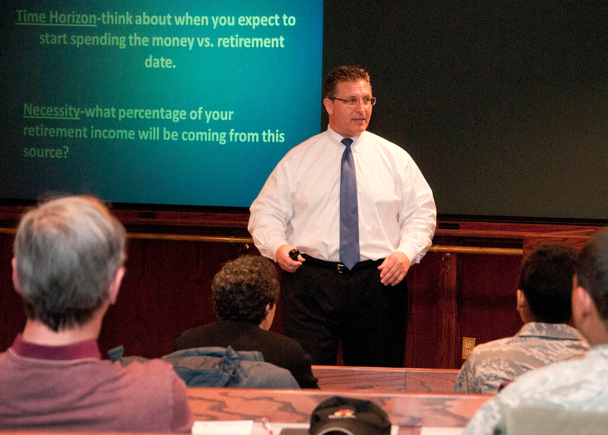 HANSCOM AIR FORCE BASE, Mass. -- Joe Delano, an LPL Financial broker-dealer agent, discusses the Thrift Savings Plan as a retirement option to military members and their families at the Hanscom Conference Center Feb. 27. The TSP class was part of Military Saves Week, an initiative that strives to motivate servicemembers and their families to improve their financial status. (U.S. Air Force photo by Mark Wyatt)