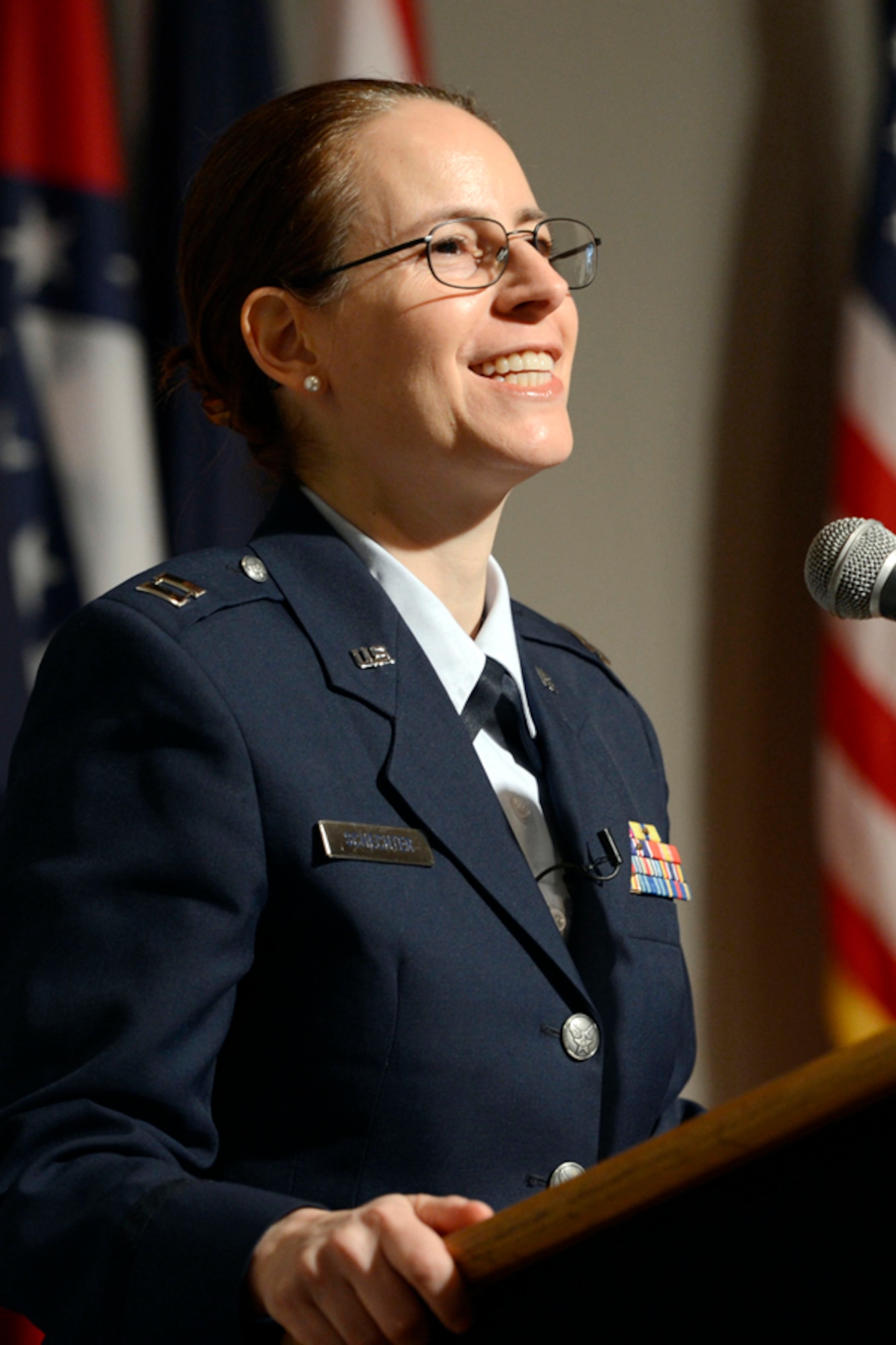 Chaplain (Capt.) Sarah Schechter of the 11th Wing at Joint Base Andrews performs master of ceremonies duty for the  new exhibit featuring women chaplains at the Women in Military Service for America Memorial at Arlington, Va., March 4, 2013.  Schechter is the Air Force’s first and only woman rabbi.(DOD photo/EJ Hersom)