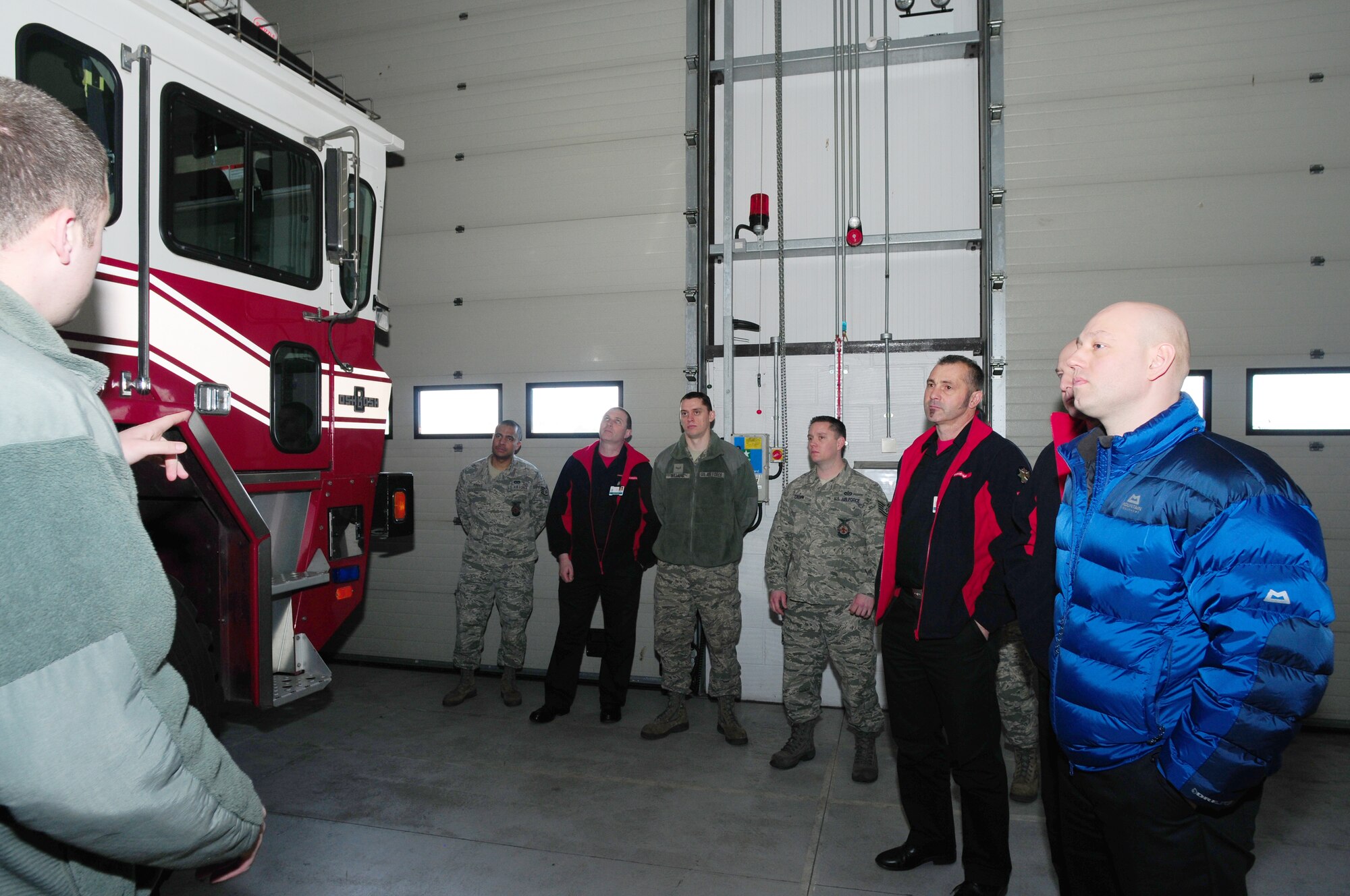 ROYAL AIR FORCE LAKENHEATH, England -- The 48th Civil Engineer Squadron Fire and Emergency Services Flight, conducted joint training with the Norfolk Fire and Rescue Service March 4, 2013. The Norfolk Fire and Rescue Service brigade received training on aircraft safety specific to firefighters such as engine shut down and pilot egress. (U.S. Air Force photo by Airman 1st Class Dana J. Butler)