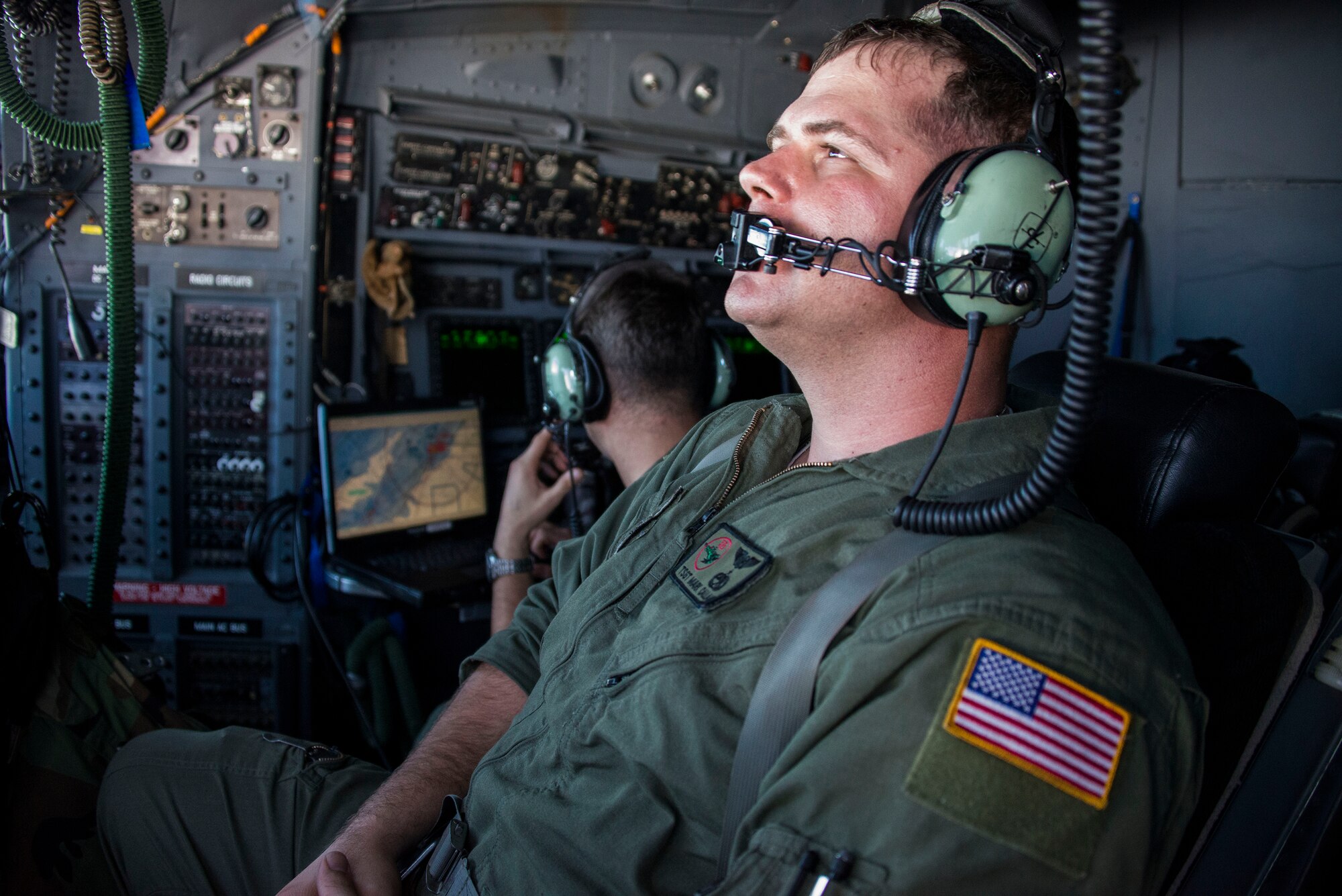U.S. Air Force Tech. Sgt. Mark Callahan, a 1st Special Operations Squadron Flight Engineer, checks flight systems on a U.S. Air Force MC-130H Combat Talon II special operations aircraft during a memorial flight for Stray 59 over Subic Bay, Philippines, Feb 26, 2013. Stray 59 was a 1st Special Operations Squadron U.S. Air Force MC-130E Combat Talon I special operations aircraft that went down in 1981 over Subic Bay, Philippines, during a training mission. (U. S. Air Force photo/Tech. Sgt. Kristine Dreyer)


