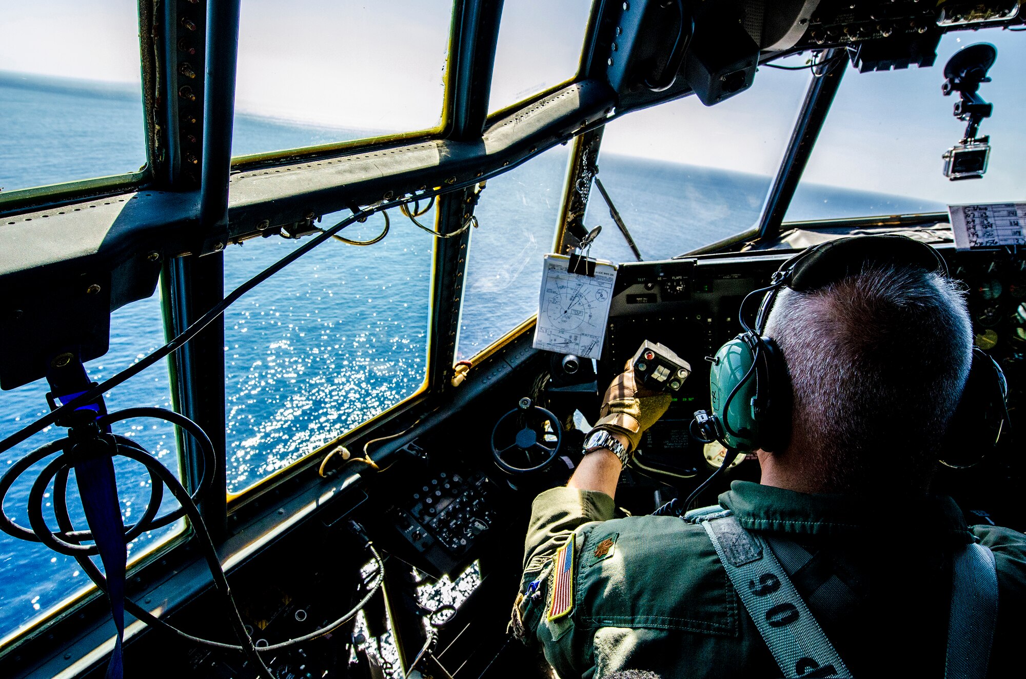 U.S. Air Force Major Richard Gunn, 1st Special Operations Squadron pilot, flies a U.S. Air Force MC-130H Combat Talon II special operations aircraft in support of the Stray 59 Memorial Ceremony over Subic Bay, Philippines, Feb 26, 2013. Stray 59 was a 1st Special Operations Squadron U.S. Air Force MC-130E Combat Talon I special operations aircraft that went down in 1981 over Subic Bay, Philippines, during a training mission (U. S. Air Force photo/Airman 1st Class Tyler Prince)