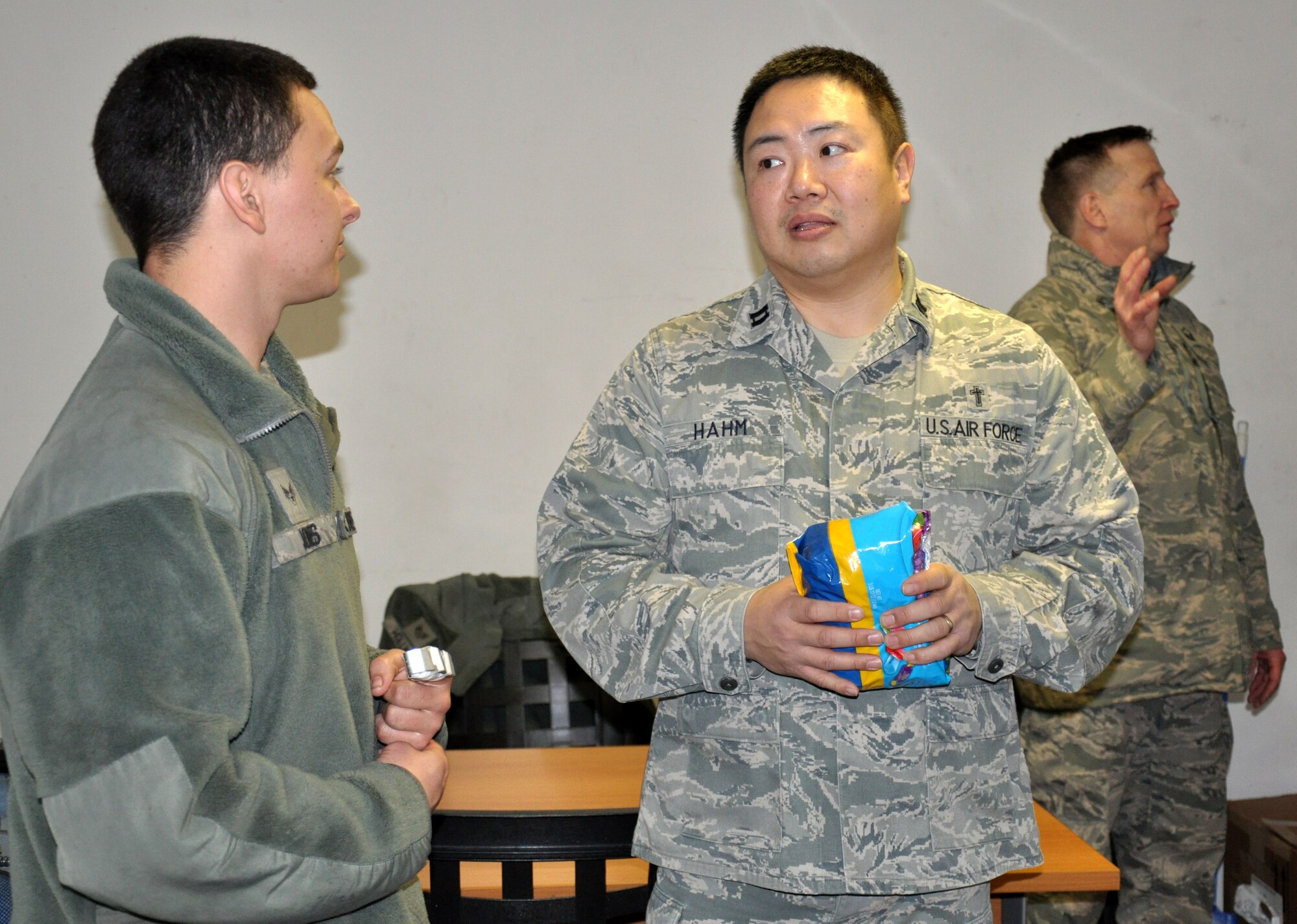 Chaplain (Capt.) Henry Hahm, 100th Air Refueling Wing, talks with Senior Airman Maverick Jones, 100th Aircraft Maintenance Squadron, during a visit with deployed Airmen March 4, 2013. As part of a KC-135 Stratotanker tail swap, Hahm visited many Airmen deployed from the 100th ARW to the 351st Expeditionary Air Refueling Squadron. The Airmen departed RAF Mildenhall, England, in January 2013 for their current deployed location in southwest Europe. Since Jan. 27, 2013, the 351st EARS has been refueling French fighter aircraft conducting operations in Mali. (U.S. Air Force photo by Capt. Jason Smith)