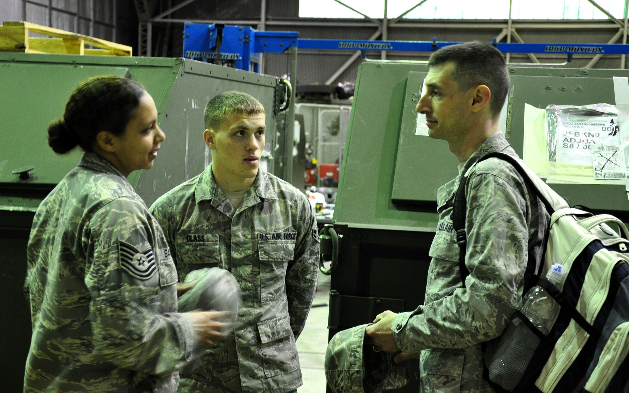 Maj. Timothy Voruz, 100th Logistics Readiness Squadron commander, talks with Tech. Sgt. Glenys Santiago (left) and Airman 1st Class Nathanael Glass, both from the 100th LRS, during a visit with deployed Airmen March 4, 2013. As part of a KC-135 Stratotanker tail swap, Vourz visited many Airmen deployed from the 100th LRS to the 351st Expeditionary Air Refueling Squadron. The Airmen departed RAF Mildenhall, England, in January 2013 for their current deployed location in southwest Europe. Since Jan. 27, 2013, the 351st EARS has been refueling French fighter aircraft conducting operations in Mali. (U.S. Air Force photo by Capt. Jason Smith)