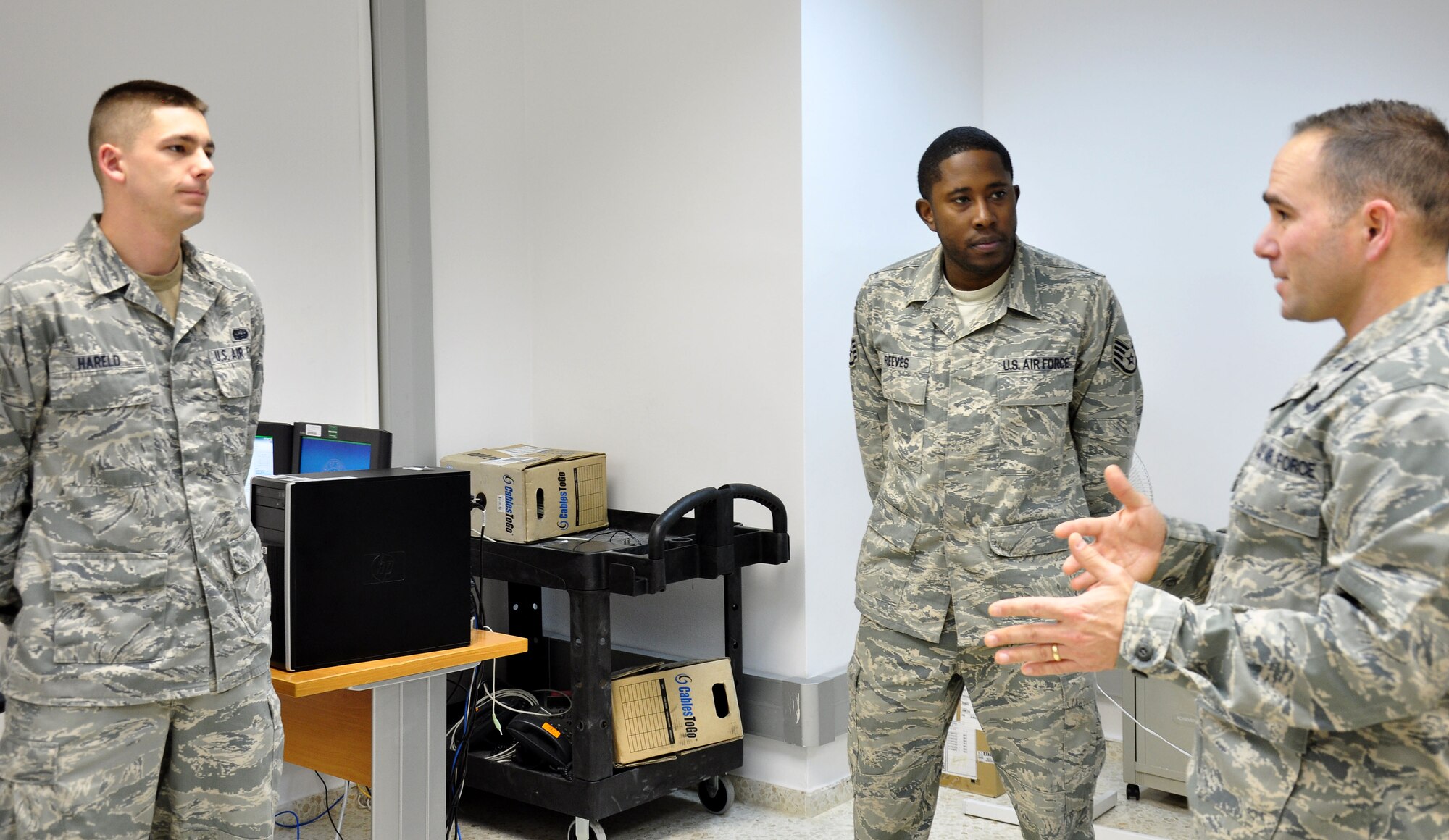 Lt. Col Albert Franke, 100th Communications Squadron commander, talks with Senior Airman Michael Hareld (left) and Staff Sgt. Ronald Reeves, both from the 100th CS, during a visit with deployed Airmen March 4, 2013. As part of a KC-135 Stratotanker tail swap, Franke visited all of the Airmen deployed from the 100th CS to the 351st Expeditionary Air Refueling Squadron. The Airmen departed RAF Mildenhall, England, in January 2013 for their current deployed location in southwest Europe. Since Jan. 27, 2013, the 351st EARS has been refueling French fighter aircraft conducting operations in Mali. (U.S. Air Force photo by Capt. Jason Smith)