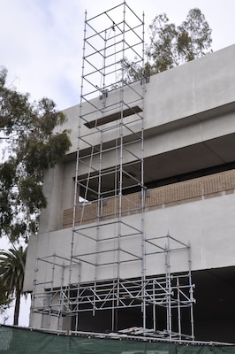 Occupational safety and health specialists like Steve McCombs ensure that scaffolding at project sites is safe and that contractor personnel are adhering to accident prevention plans.