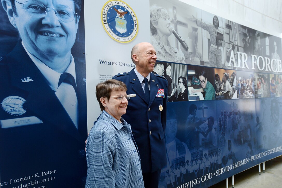 Air Force Chief of Chaplains Maj. Gen. Howard D. Stendahl and retired Air force Maj. Gen Lorraine K. Potter, former chief of chaplains, pose for a photograph the women chaplains exhibit at the Women in Military Service for America Memorial at Arlington, Va., March 4, 2013. 