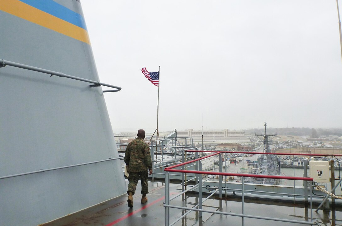 Gunnery Sgt. Roy Henderson, a Brooklyn, N.Y., native and the detachment chief, scouts the USNS Robert E. Peary as a detachment of Marines from 2nd Supply Battalion, 2nd Marine Logistics Group departed Norfolk, Va., for a deployment to replenish the 26th Marine Expeditionary Unit. Four Marines from 2nd Supply Bn. utilized a new supply system through the Navy from Feb. 7 to 17, 2013.