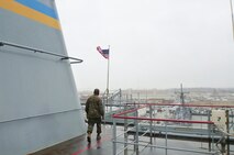 Gunnery Sgt. Roy Henderson, a Brooklyn, N.Y., native and the detachment chief, scouts the USNS Robert E. Peary as a detachment of Marines from 2nd Supply Battalion, 2nd Marine Logistics Group departed Norfolk, Va., for a deployment to replenish the 26th Marine Expeditionary Unit. Four Marines from 2nd Supply Bn. utilized a new supply system through the Navy from Feb. 7 to 17, 2013.