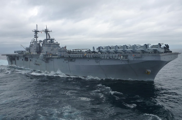 One of the naval vessels attached to the 26th Marine Expeditionary Unit awaits the arrival of the Marines from 2nd Supply Battalion, 2nd Marine Logistics Group for replenishment. As the ship arrived, four Marines aboard the USNS Robert E. Peary utilized a new supply system to restock the 26th MEU, Feb. 13, 2013. 