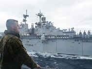 Cpl. Josten Mobley, a Hildebran, N.C., native and the detachment ‘s customer service clerk, enjoyed the sea breeze on his deployment to replenish the 26th Marine Expeditionary Unit with a detachment of Marines with 2nd Supply Battalion, 2nd Marine Logistics Group.  The four Marines aboard the USNS Robert E. Peary utilized a new supply system through the Navy from Feb. 7 to 17, 2013. 