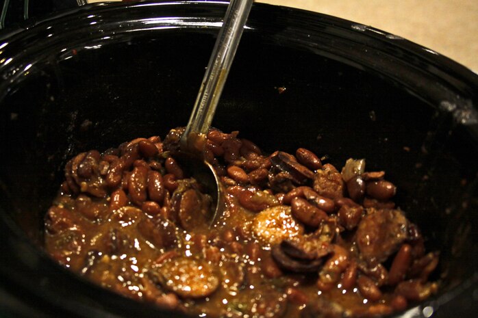 Gumbo with beans served at Mardi Gras night held at the Hornet’s Nest here, Feb. 12, 2013. Single Marine Program hosted the event with free food, games and music. Participants were able to enter tournaments and win prizes throughout the night.