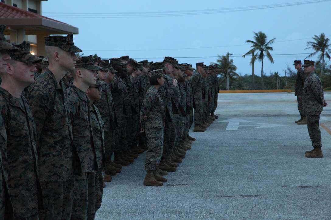 Marines with Combat Logistics Detachment 39, Guam, form up Feb. 14 on NCTS during Exercise Guahan Shield.  Guahan Shield will facilitate multiservice engagements, set conditions for bilateral and multilateral training opportunities, and support rapid response to potential theater crises and contingency operations in the Asia-Pacific region.  Combat Logistics Detachment 39 is part of 9th Engineer Support Battalion, 3rd Marine Logistics Group, III Marine Expeditionary Force. 