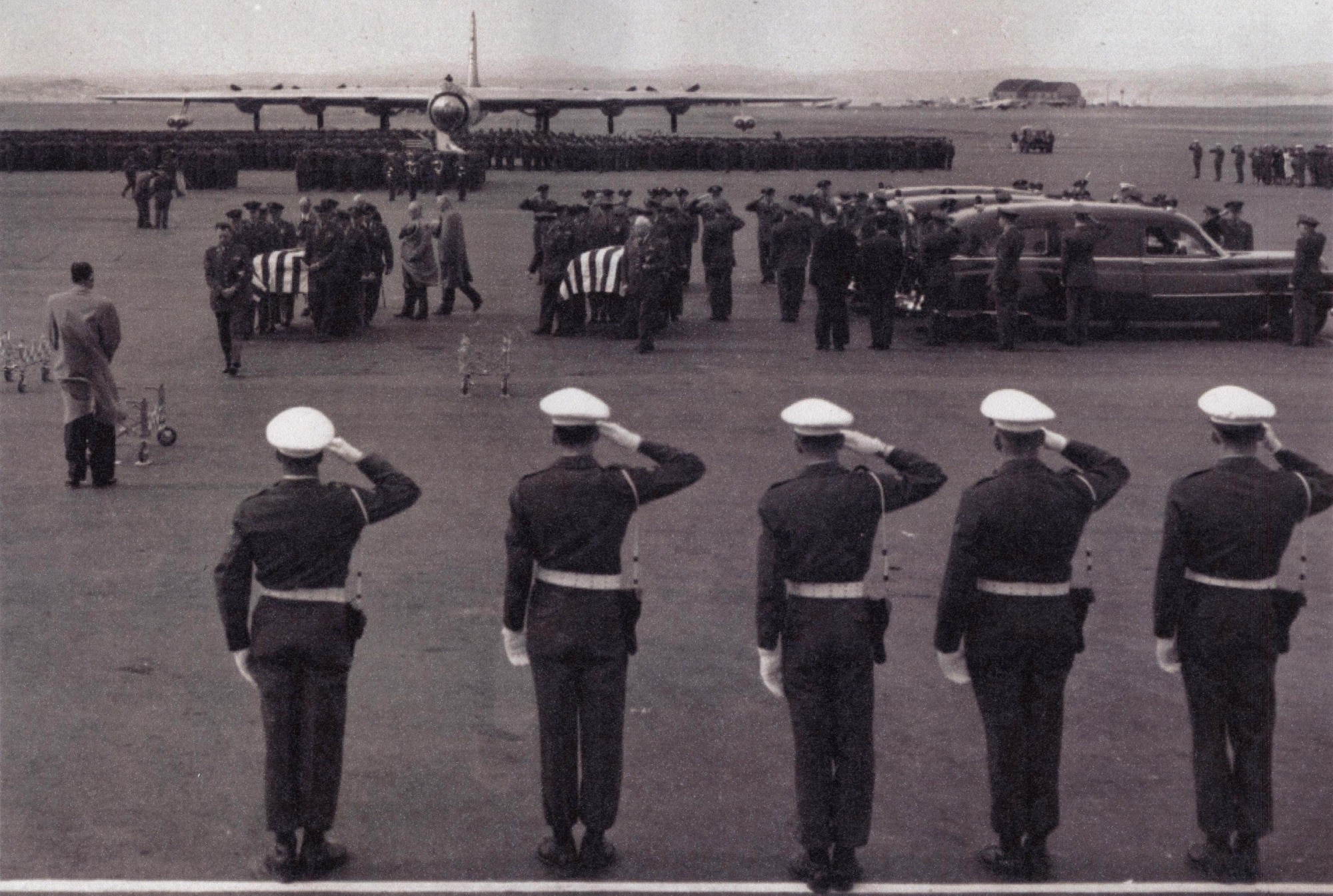 A mass formation of troops presents a final salute in tribute to Brig. Gen. Richard E. Ellsworth during a ceremony renaming the base in their late wing commander’s honor June 13, 1953. (Courtesy photo from South Dakota Air and Space Museum) 
