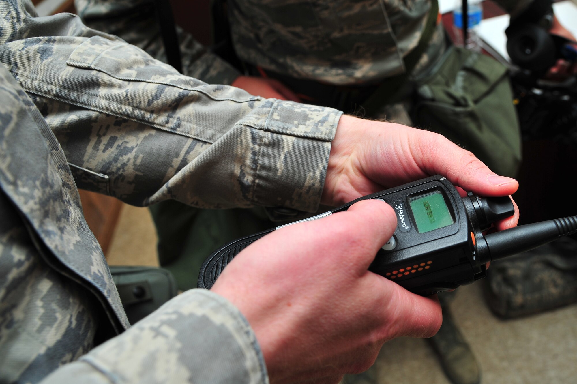 A U.S. Air Force Airman assigned to the 4th Fighter Wing conducts a operational check on the channels of a land mobile radio during Operational Readiness Inspection CORONET WHITE, at a simulated deployed location on Seymour Johnson Air Force Base, N.C., Mar. 7, 2013. Communication is essential to mission accomplishment, therefore several units use LMRs to relay information. (U.S. Air Force photo/Airman 1st Class Aubrey White/Released)