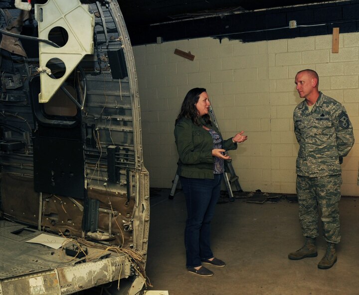 Amy Russell, Barksdale Global Power Museum director, speaks with Chief Master Sgt. Brian Hornback, Command Chief of Air Force Global Strike Command, about museum renovation plans on Barksdale Air Force Base, La., March 5. During his tour of the 2nd Bomb Wing, Hornback met with various Airmen and squadrons to discuss any concerns or issues they had. (U.S. Air Force photo/Senior Airman Sean Martin)