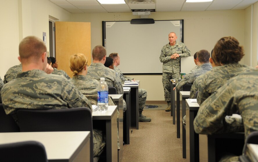Chief Master Sgt. Brian Hornback, Command Chief of Air Force Global Strike Command, speaks with Airmen from the First Term Airmen Center during his visit to the 2nd Bomb Wing on Barksdale Air Force Base, La., March 5. During his tour, Hornback met with various Airmen and squadrons to discuss any concerns or issues they had. (U.S. Air Force photo/Senior Airman Sean Martin)