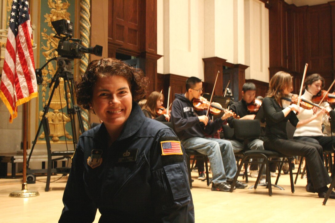 SMSgt Sandy Tiemens takes a break during a sound check with the Detriot Symphony Youth Orchestra during a recent Education Outreach tour.