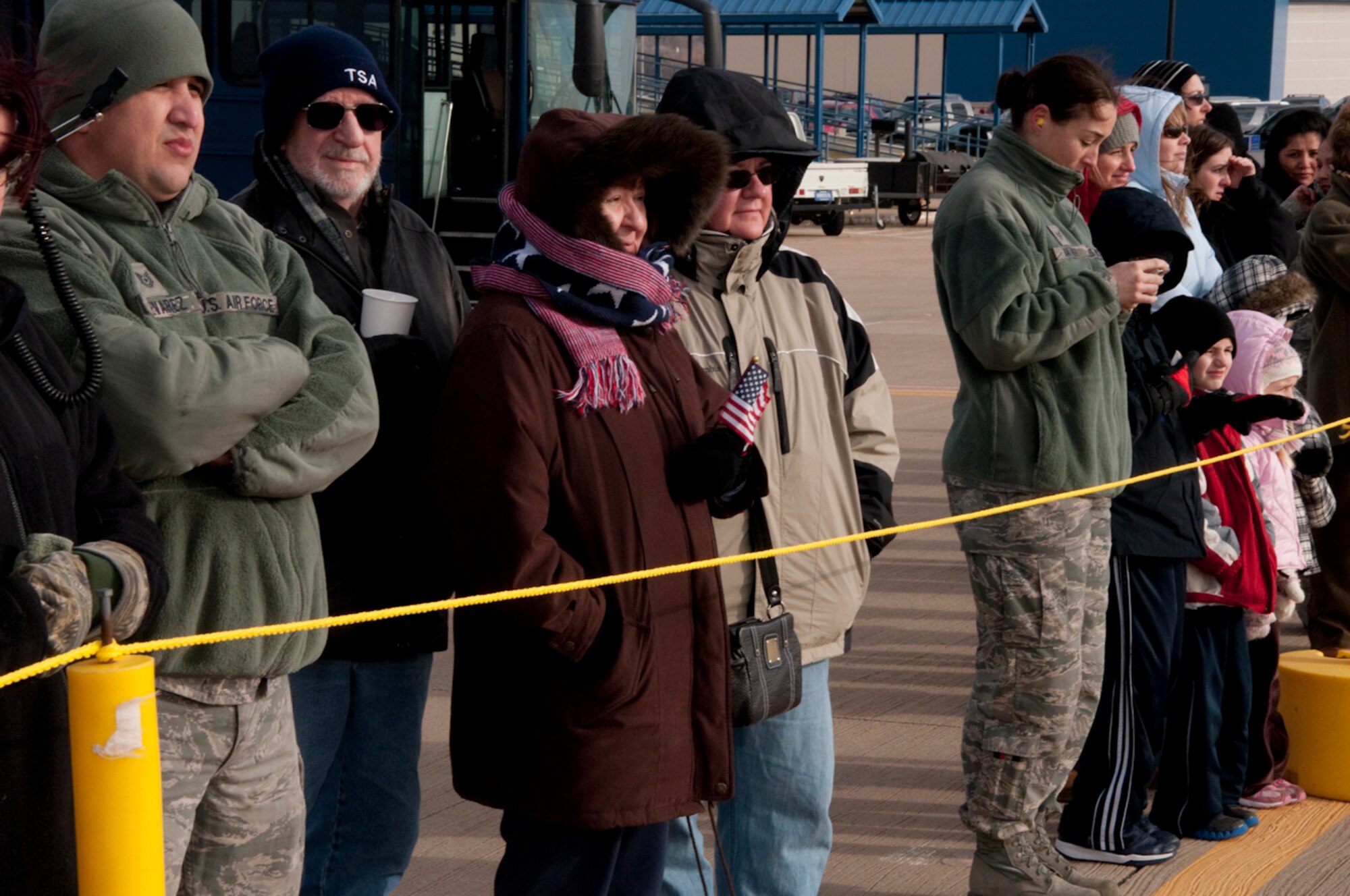 Despite the cold weather Airmen of the 136th Airlift Wing and their families gather together prior to departing for Southwest Asia at NAS Fort Worth JRB, Texas, Feb. 26, 2013. The Airmen will support the Air Expeditionary Forces in Southwest Asia from 60 to 180 days.. (National Guard photos by Airman Cody Witsaman/released)