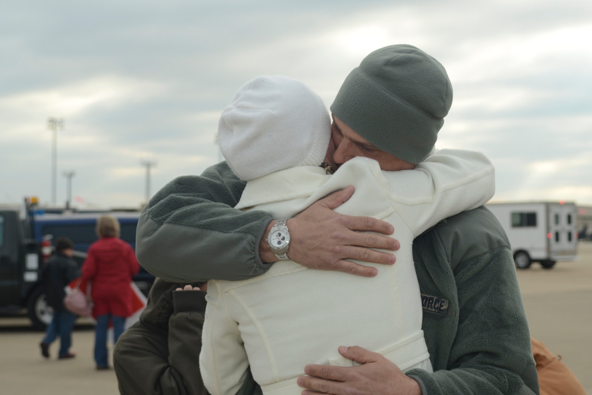 Saying goddbye is never easy as Airmen of the 136th Airlift Wing and their families gather together prior to departing for Southwest Asia at NAS Fort Worth JRB, Texas, Feb. 26, 2013. The Airmen will support the Air Expeditionary Forces in Southwest Asia from 60 to 180 days. (National Guard photos by Senior Master Sgt. Elizabeth Gilbert)