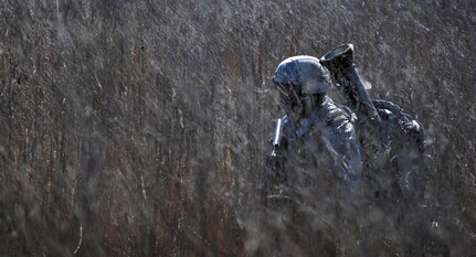 Staff Sgt. Cameron Cochran, a patrolman with the 412th Security Forces Squadron, secures the perimeter of a simulated extraction point. Cochran and 46 fellow Airmen spent 26 days in February attending the Combat Leadership Course, Level II, at Joint Base San Antonio-Camp Bullis, Texas. He and 42 Security Forces Airmen spent the six weeks learning Security Forces operations and practical field skills such as moving as teams and squads, as well as conducting missions in the field. The course is taught several times during the year through the Security Forces Academy, part of the 343rd Training Squadron at JBSA-Lackland. (U.S. Air Force photo by Senior Airman Matthew Fredericks/Released)
